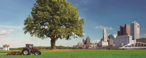 farm with downtown Columbus in background